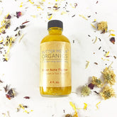 Super Acne Fighter organic acne treatment oil serum in a recyclable glass bottle